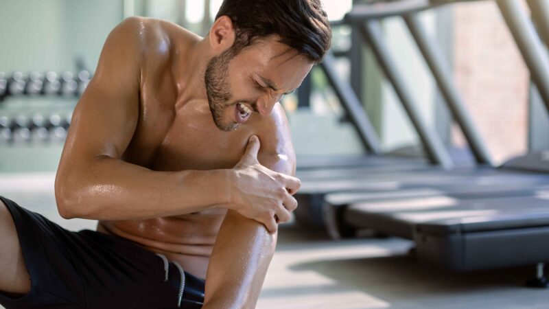 male-athlete-injured-his-shoulder-gym-s-workout